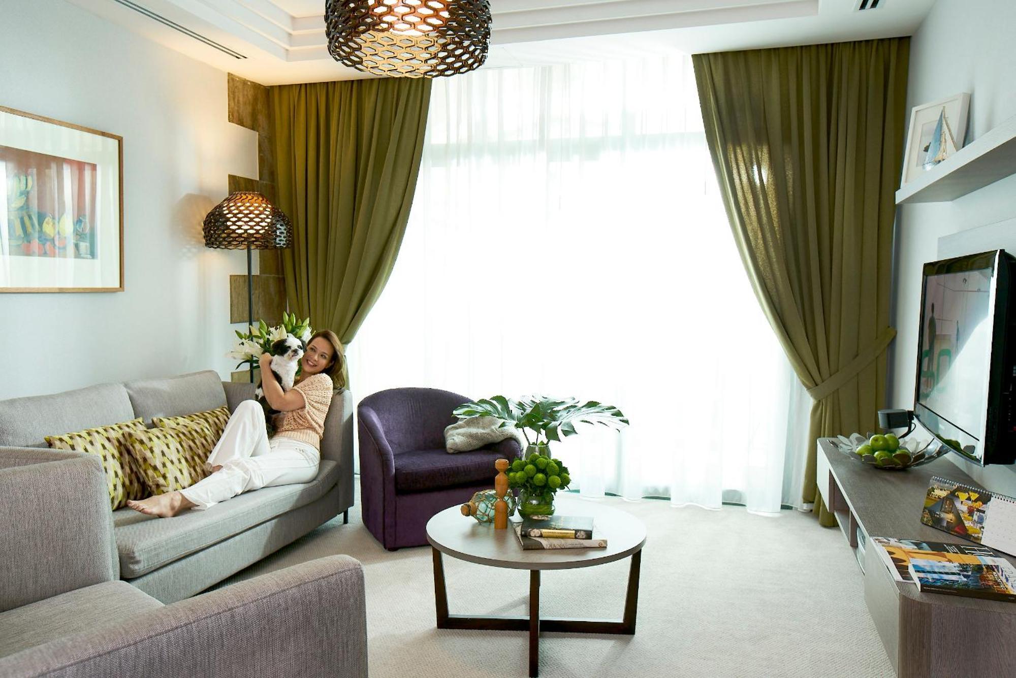 Fraser Place Robertson Walk Singapur Exterior foto A living room in a hotel suite